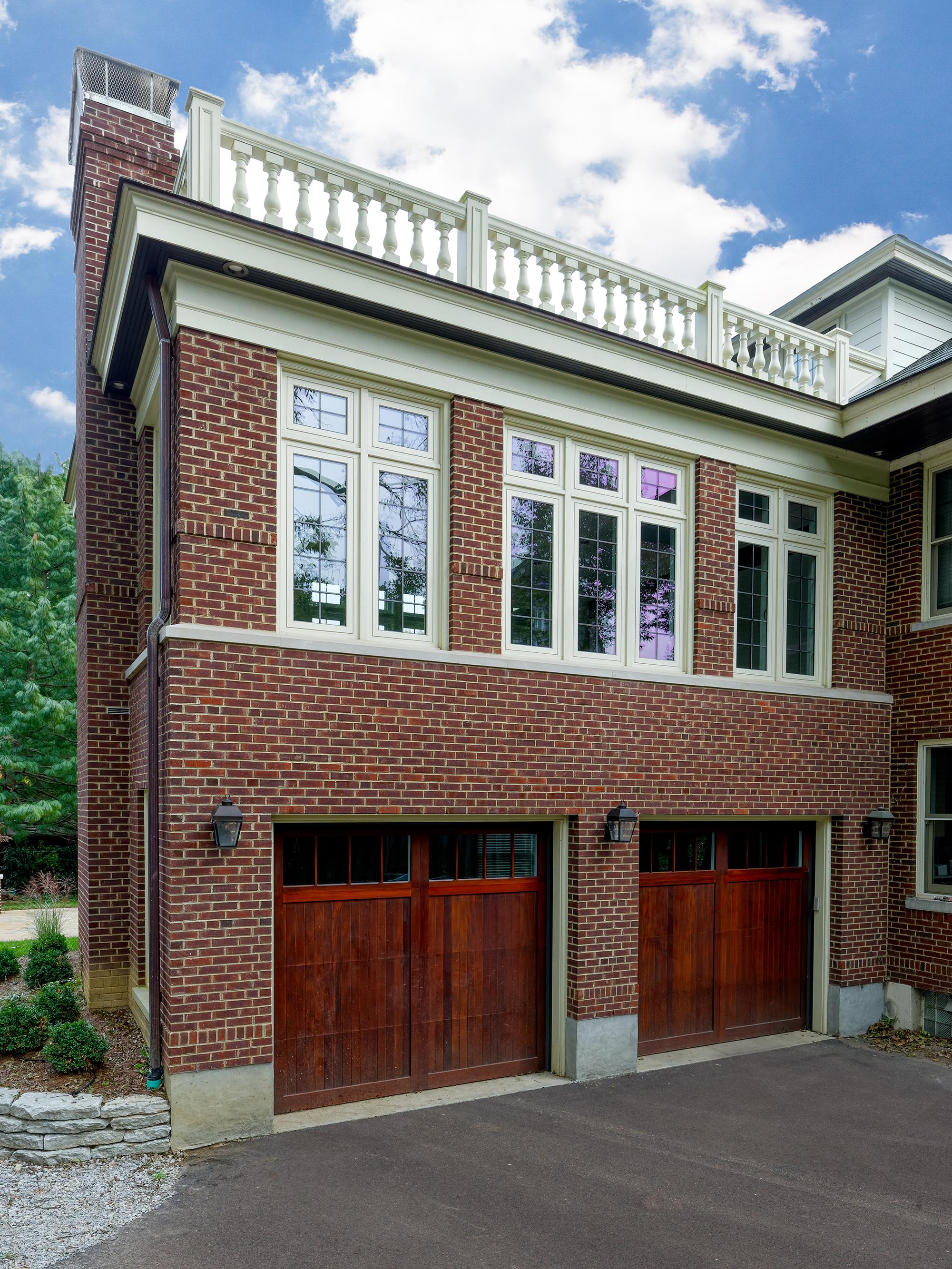 brick garage with second-story family room addition above